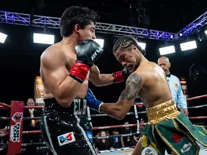 Rene Tellez Giron (left) lands a left hook on Maliek Montgomery in the co-feature of a ProBox TV card at Thunder Studios in Long Beach, California. (March 28, 2026)