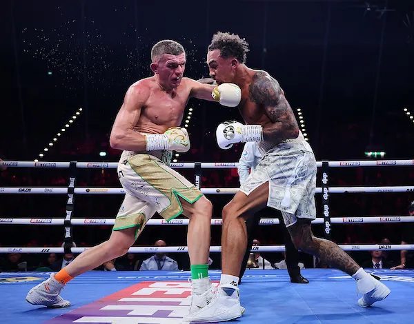 BOMBS FLY: Ben Whittaker [right] and Conor Wallace engage in warfare