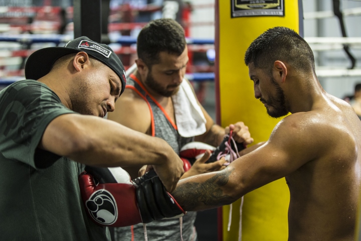 Coach Luis Garcia helps get Abner Mares ready for battle
